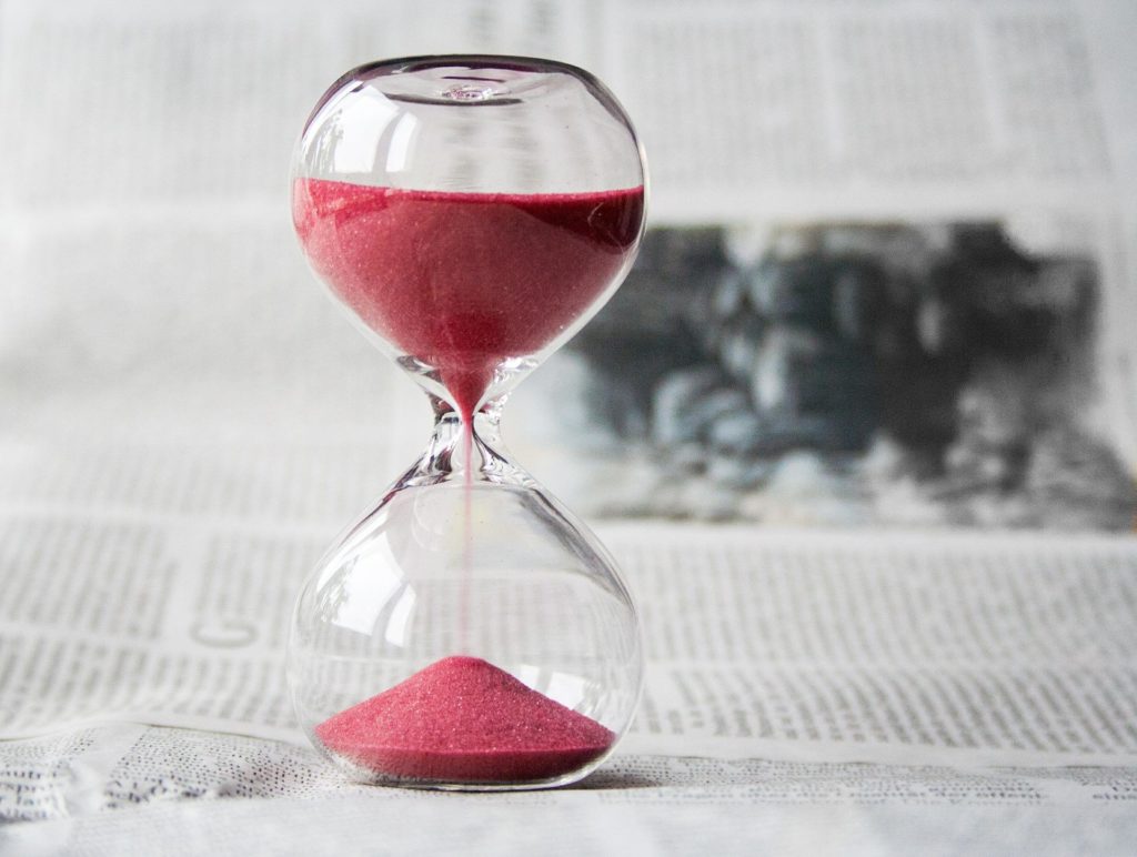 a picture of an hourglass representing Term Life Insurance about to expire