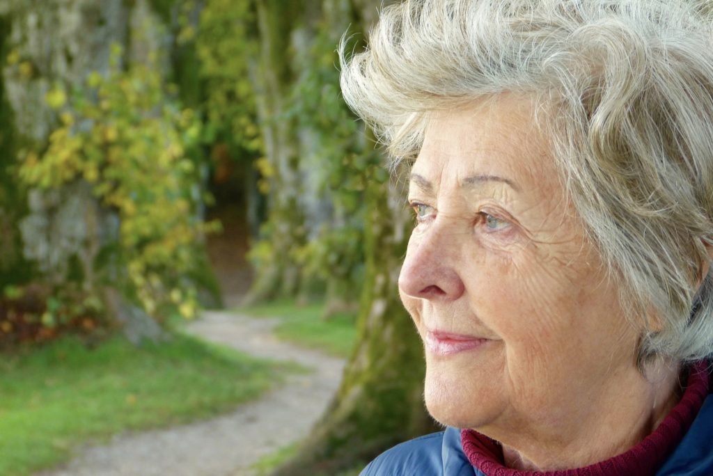 An elderly woman contemplating retirement